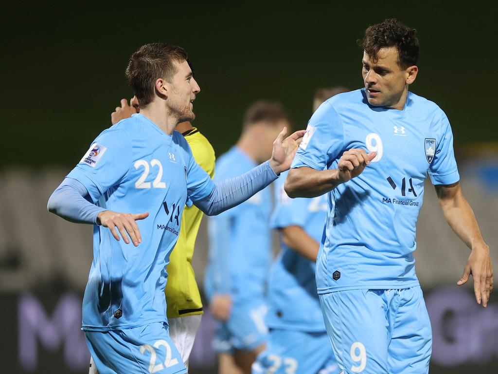 Sydney FC’s Bobo (right) celebrates scoring a goal with teammate Max Burgess. Picture: Mark Kolbe/Getty Images