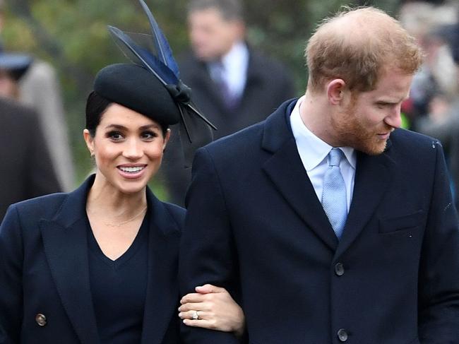 Meghan and Harry … has she been bad for his hairline? Picture: AFP