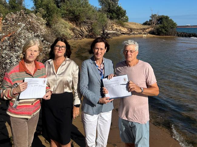 left to right: Natalie Gray (resident), member for southwest coast and shadow minister for Ports and Freight Roma Britnell, shadow minister for Public Land Management, Nationals member for Eastern Victoria Region, Melina Bath and Dr Stephen Lapin (resident) holding the petitions. Picture: Supplied