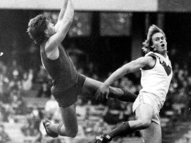 Gerard Healy marks for the Dees.