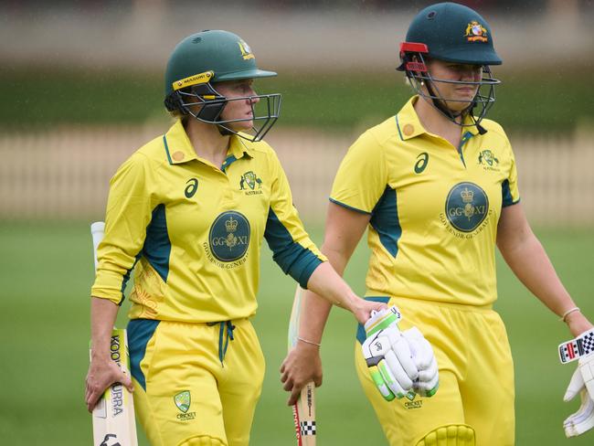 SYDNEY, AUSTRALIA - JANUARY 09: Alyssa Healy of Australia and Georgia Voll of Australia walk from the field as rain delays the match during the One Day match between Governor General's XI and England Women at North Sydney Oval, on January 09, 2025, in Sydney, Australia. (Photo by Brett Hemmings/Getty Images)