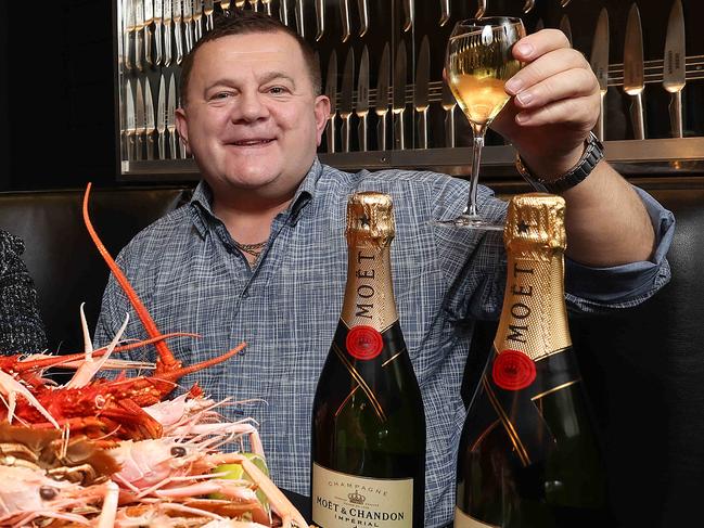 The Lobster Cave restaurant in Beaumaris is giving away free Salt & Pepper Squid with every lunch order on weekends for locals within 5km, until the end of lockdown 6.0. Executive Chef Krist Vatanopast , Dina Ferg and owner Bill Ferg. Picture : Ian Currie