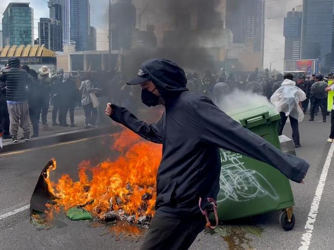 Fires burn in Melbourne during anti-war protest