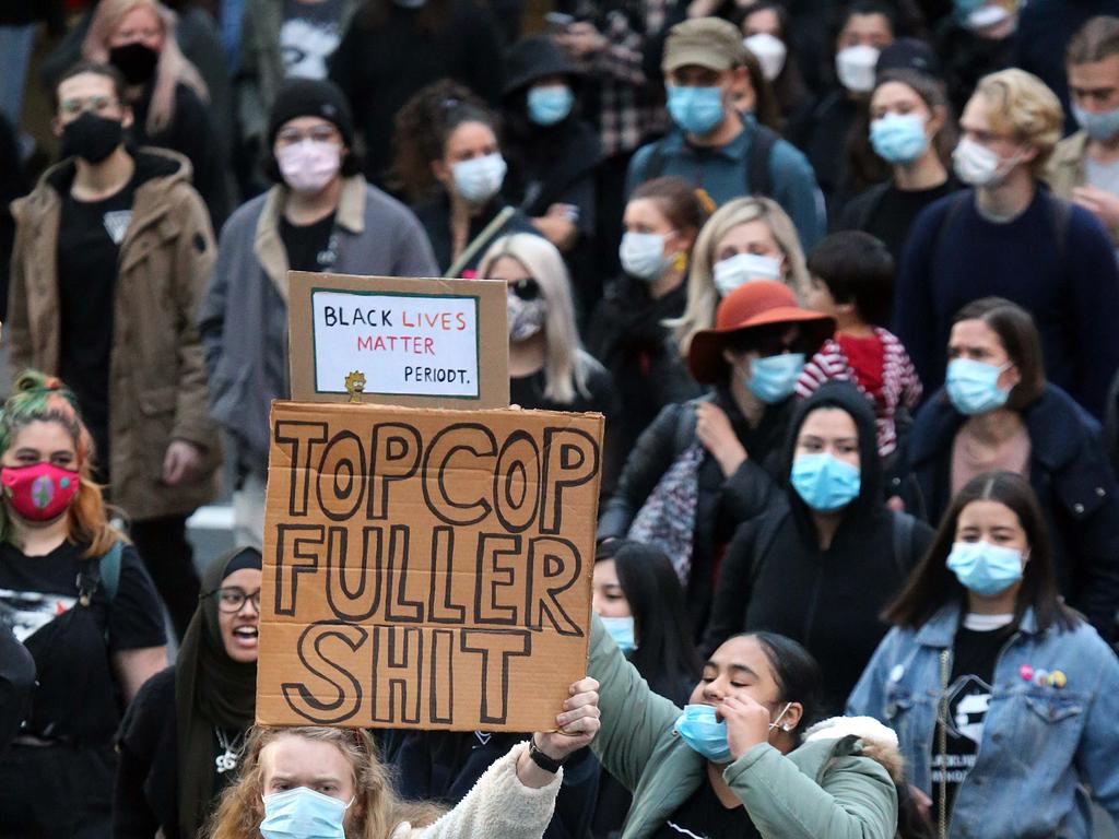 Many in the crowds wore face masks.