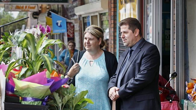 Greater Dandenong Mayor Jim Memeti in Menzies St, Dandenong with shopper Jenny Brown. 