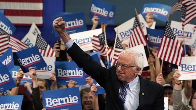 Fist of fury: Bernie Sanders has a swing and a miss at Donald Trump. Picture: AFP