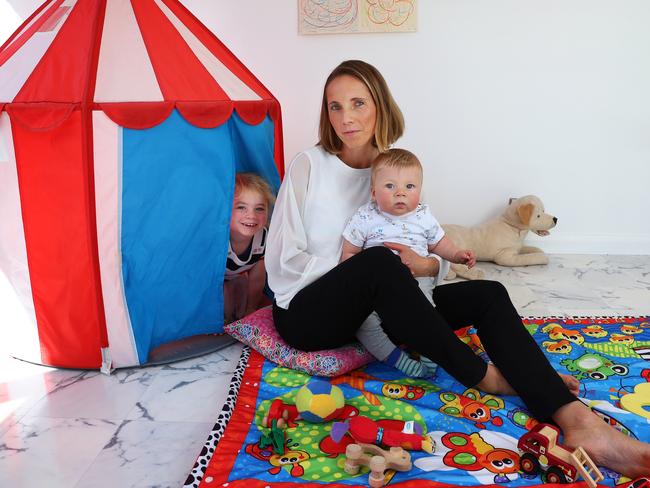 16/10/18: Ivonne Ranisch with daughterOctavia and son Oslo at their home in Seaforth, Sydney. Ivonne Ranisch has been granted permission to exhume the grave of her infant brother in Dresden, East Germany. The story is about the mystery behind a German family's child - possibly dead at the time, possibly adopted by an East German family during the tensions between East and West Germany. John Feder/The Australian.