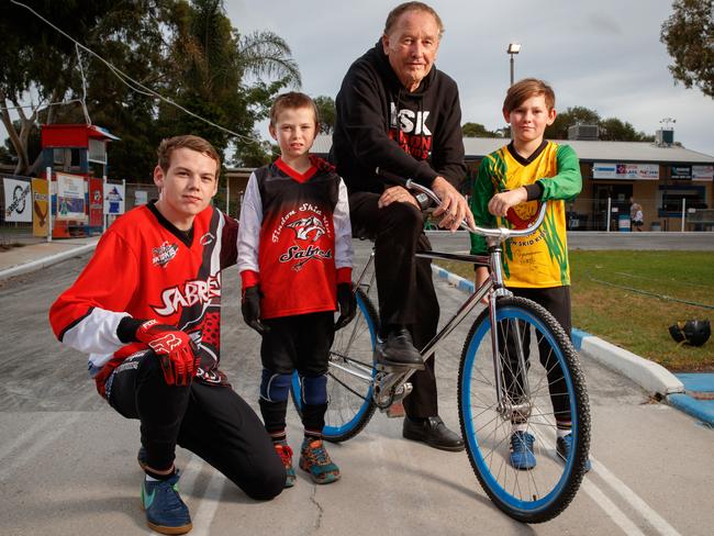 Mick Harley with Braden, 20, Dylan, 8, and Brad, 11, at the Findon Skid Kids circuit (left). Picture: MATT TURNER