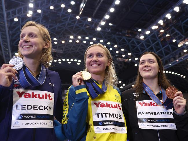 Katie Ledecky (left) with the silver medal after being edged out by Ariarne Titmus. Picture: Clive Rose/Getty Images