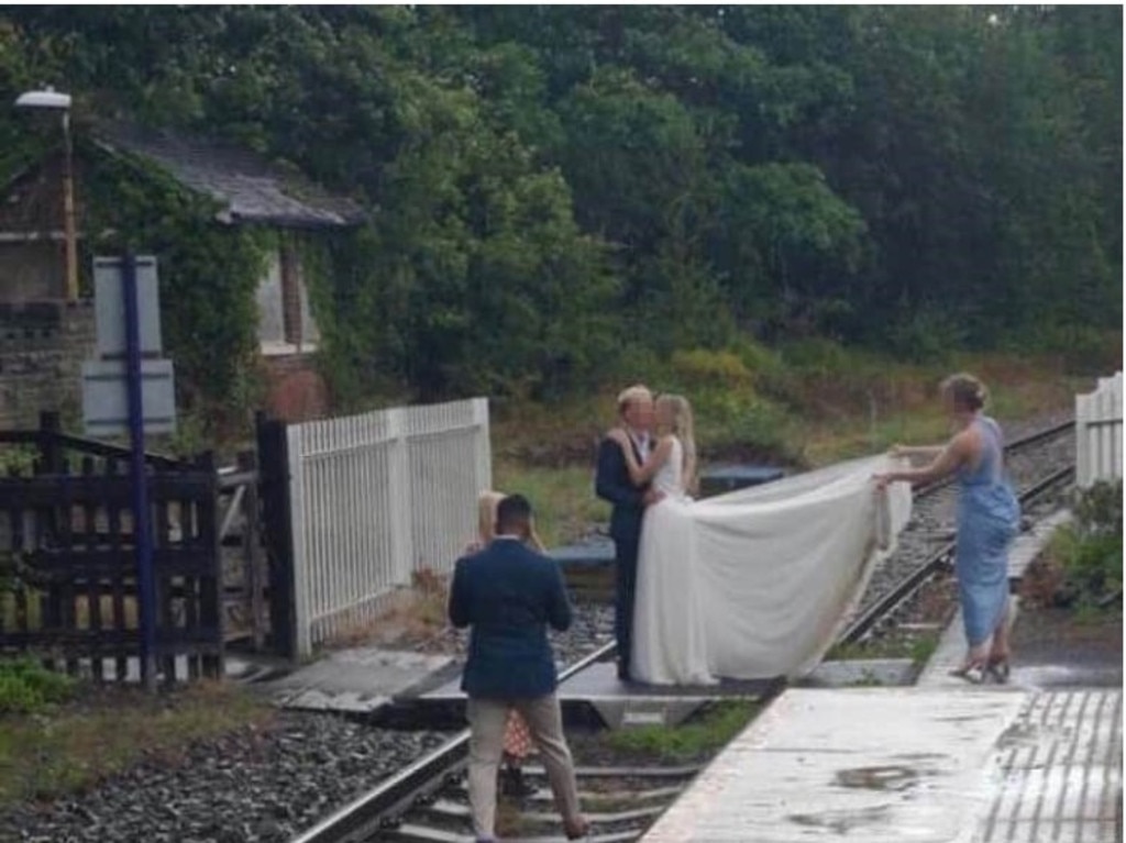 Stunning photo or ‘stupidity’? This couple has inadvertently become the face of a safety campaign. Picture: Network Rail