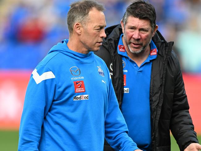 HOBART, AUSTRALIA - AUGUST 06: Alastair Clarkson, Senior Coach of the Kangaroos and Brett Ratten, Assistant Coach of the Kangaroos are seen during the round 21 AFL match between North Melbourne Kangaroos and Melbourne Demons at Blundstone Arena, on August 06, 2023, in Hobart, Australia. (Photo by Steve Bell/Getty Images)