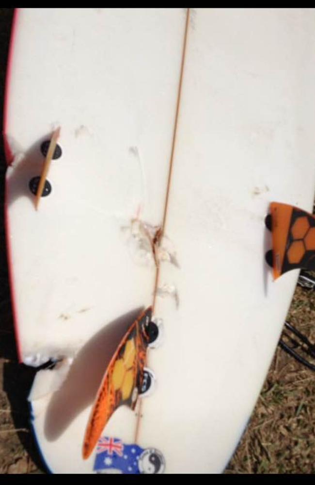 Ballina surfboard shaper Scott Crump posted this photo of the board damaged by a shark at Ballina. Photo: Facebook