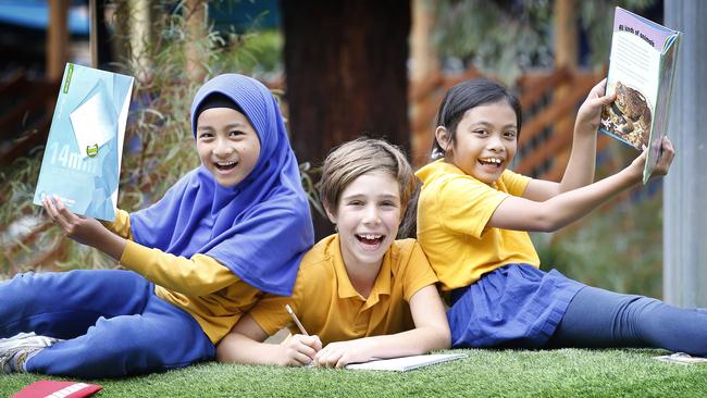 Year 4 students Nafisa 9, Orpheus 9 and Serena 8 from multicultural Moreland Primary School. Picture: David Caird