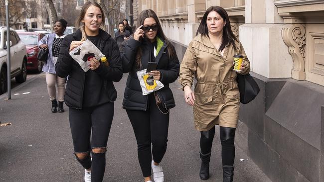 Roberta Williams (right) is seen with daughter Dhakota (centre) and friend arriving at the Melbourne Supreme Court earlier this year. AAP Image/Daniel Pockett