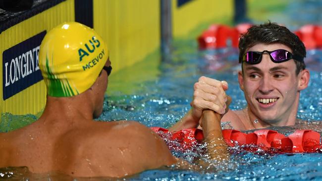 England's Benjamin Proud (right) is congratulated by Australia's Cameron McEvoy after winning his men's 50m freestyle semi-final. Photo: AFP