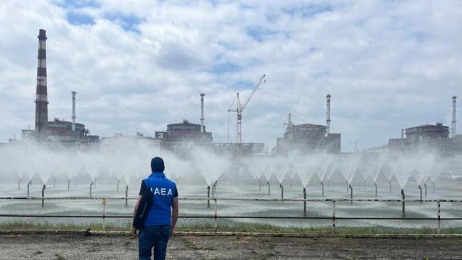 A member of the International Atomic Energy Agency walking near the Zaporizhzhia Nuclear Power Plant in 2023. Picture: International Atomic Energy Agency / AFP.