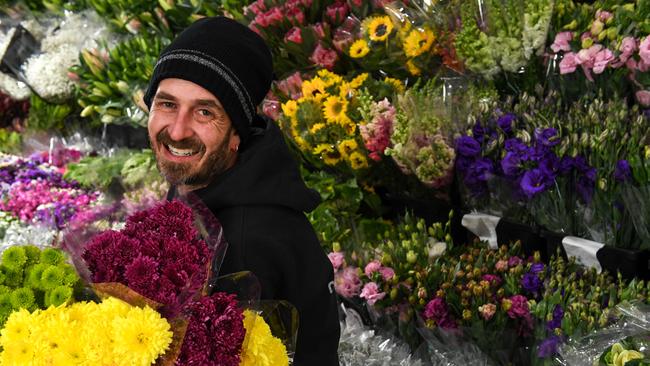 Florist and grower Joe Cuda with some Chrysanthemums at Cuda's Bros flowers in Mordialloc. PICTURE: PENNY STEPHENS