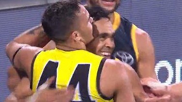 Stack shares a moment on the field with his idol Eddie Betts. Picture: Channel 7