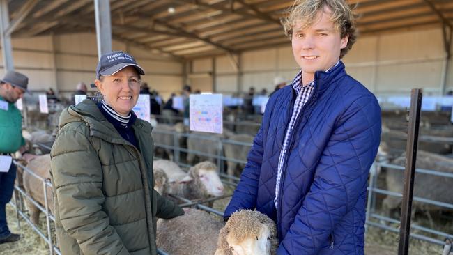 Mandy and Jamieson Bouffler of Trigger Vale, Lockhart, NSW, with ram six which sold for $5000.