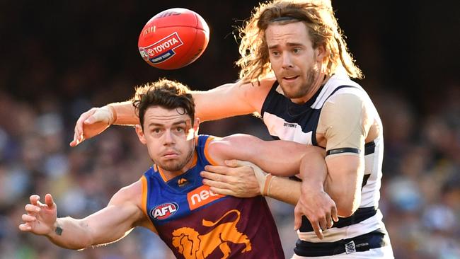 Will Cat Cameron Guthrie, right, tag star Lion Lachie Neale? Picture: Darren England/AAP