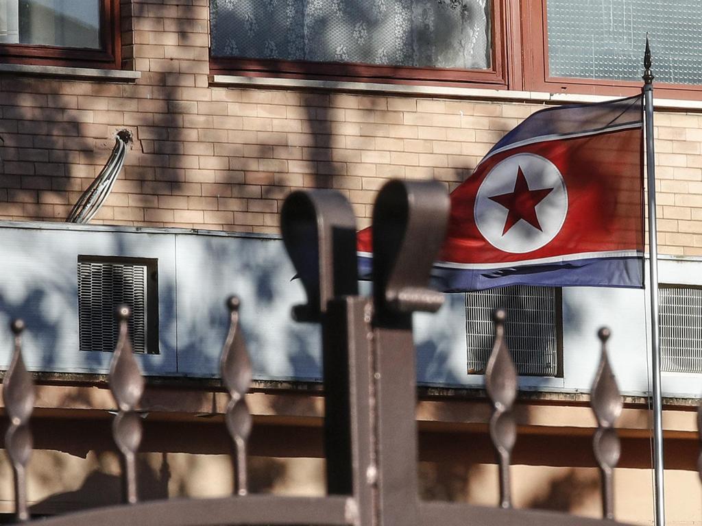 The flag of North Korea waves inside the compound of the North Korean embassy in Rome. Picture: AP