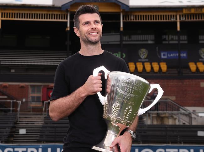 MELBOURNE, AUSTRALIA - AUGUST 10: Trent Cotchin poses for a portrait with the 2017 premiership cup after announcing his retirement from AFL during a press conference at Punt Road Oval on August 10, 2023 in Melbourne, Australia. (Photo by Kelly Defina/Getty Images)