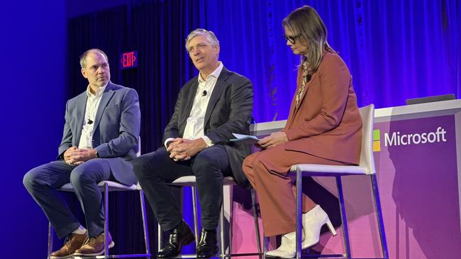 BOQ chief technology officer Rob Wilson (centre) speaks on a panel at Microsoft Ignite in Chicago.