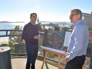 MINISTER'S CALL: Cameron Dick and Richard Austin with a map of the proposed development on Hummock Hill. Picture: Greg Bray