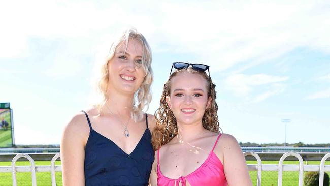 Carlee Magick and Ashleigh Robinson at Coast to Coast Raceday, Corbould Park. Picture: Patrick Woods.