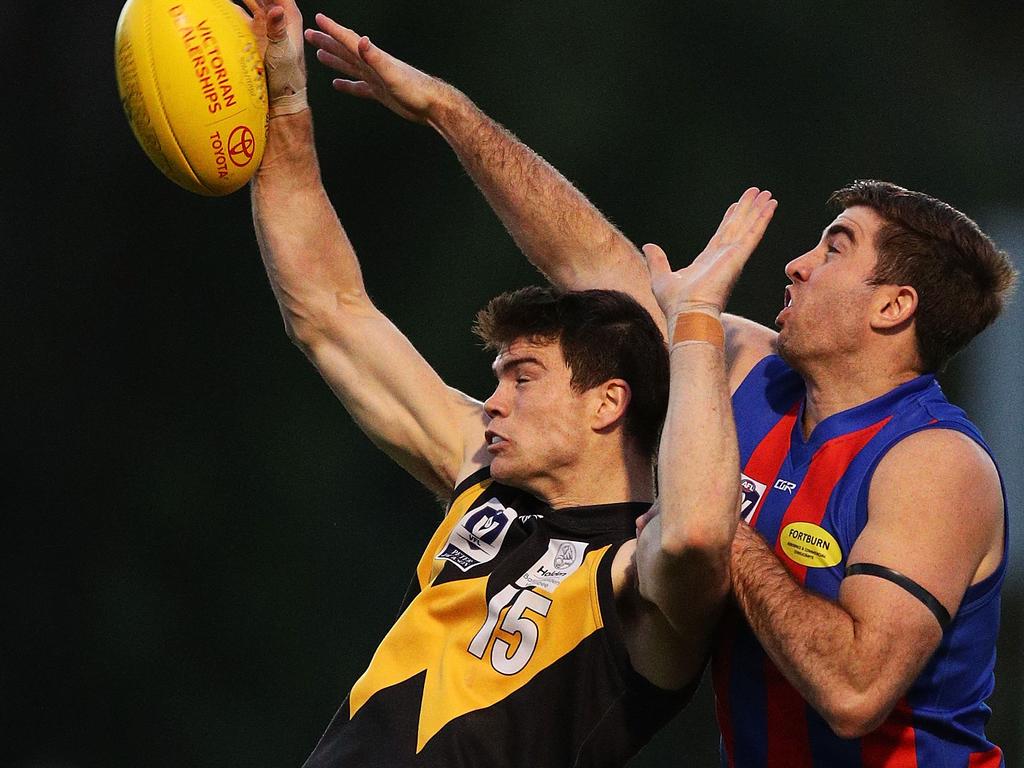 Sam Collins (left) battles with Port Melbourne’s Jordan Lisle. Picture: Getty Images