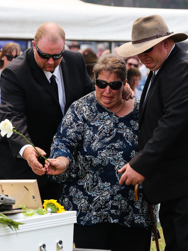 Janelle Salway, wife of Robert Salway, with her two sons Tim and Aaron. Picture: Gaye Gerard