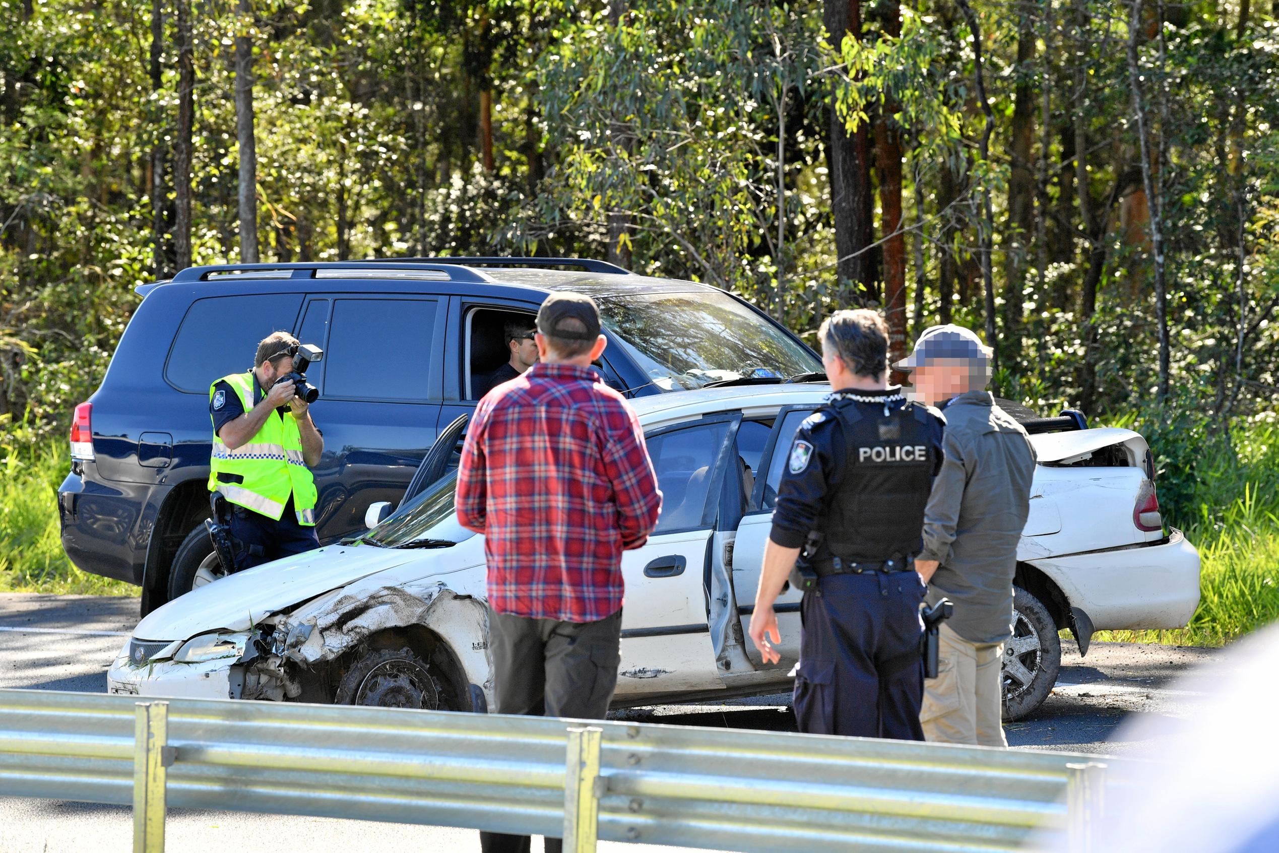 The police chased a car from north of Gympie and dozens of police apprehended a man near Parklands, just north of Nambour on the Bruce Highway. Traffic was stopped in both directions for several hours.