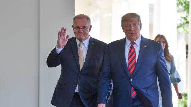 Mr Trump accompanies Mr Morrison to the Oval Office.