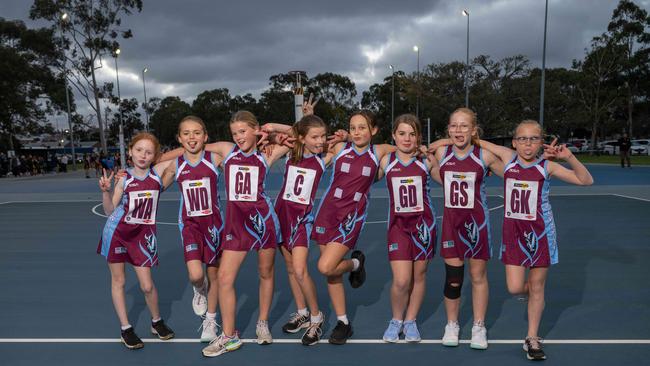 Modewarre Maroon under-11 netball team pull their funniest faces.