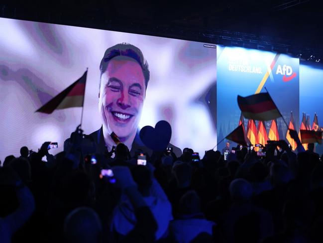 Tech billionaire Elon Musk speaks live via a video transmission during a speech by Alice Weidel, chancellor candidate of the far-right Alternative for Germany (AfD) political party, at the AfD election campaign launch rally. Picture: Getty Images