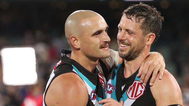 Sam Powell-Pepper of the Power with Travis Boak after the match during the 2023 AFL Second Semi Final match between the Port Adelaide Power and the GWS GIANTS at Adelaide Oval on September 16, 2023 in Adelaide, Australia. (Photo by Sarah Reed/AFL Photos via Getty Images)