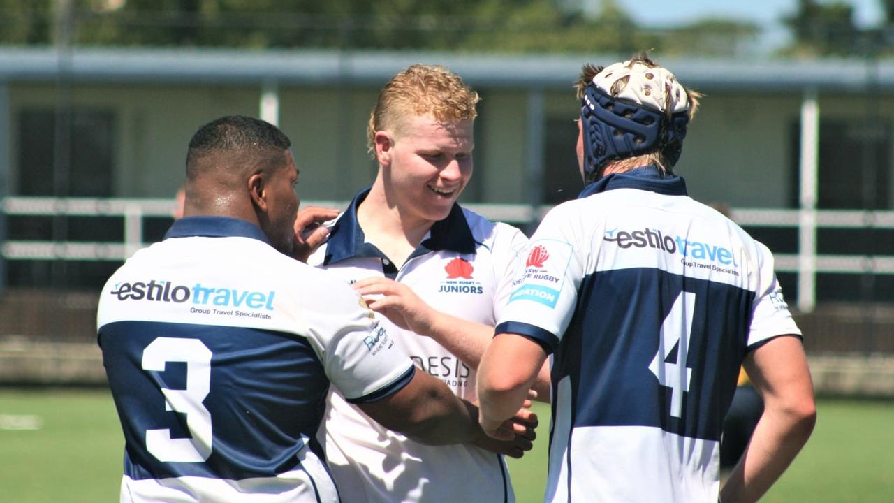 Young rugby player Jamie Clarke celebrating with NSW Juniors teammates. Pic Supplied