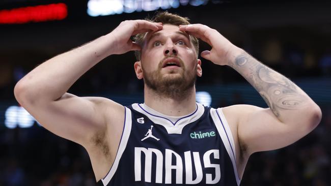 DALLAS, TX - FEBRUARY 26 : Luka Doncic #77 of the Dallas Mavericks reacts late in the game against the Los Angeles Lakers in the second half at American Airlines Center on February 26, 2023 in Dallas, Texas. The Lakers won 111-108. NOTE TO USER: User expressly acknowledges and agrees that, by downloading and or using this photograph, User is consenting to the terms and conditions of the Getty Images License Agreement. (Photo by Ron Jenkins/Getty Images)