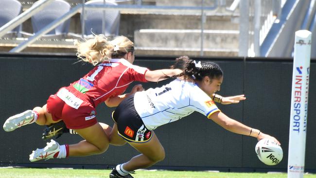 Souths Logan player Kiarah Siauane of Mabel Park SHS scoring for the Magpies.Picture, John Gass