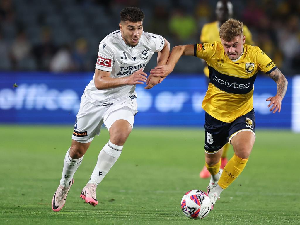 Victory’s Zinedine Machach competes for the ball with Central Coast’s Alfie McCalmont. Picture: Getty Images