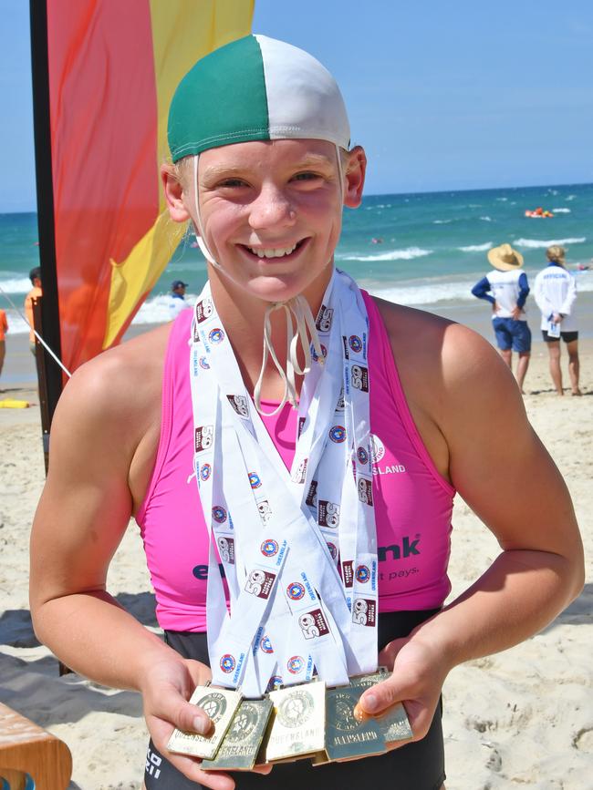 Ava Usher with her medals from the Queensland Youth Surf Lifesaving Championships at Burleigh. Picture: HARVPIX