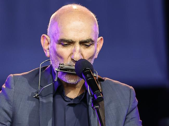 MELBOURNE, AUSTRALIA - DECEMBER 15: Paul Kelly performs during the State Memorial Service on December 15, 2022 in Melbourne, Australia. The State Memorial Service was held to celebrate the life and music of Archie Roach, an accomplished indigenous musician who was inducted into the ARIA hall of fame in 2020, and died in July last year. (Photo by Sam Tabone/Getty Images)