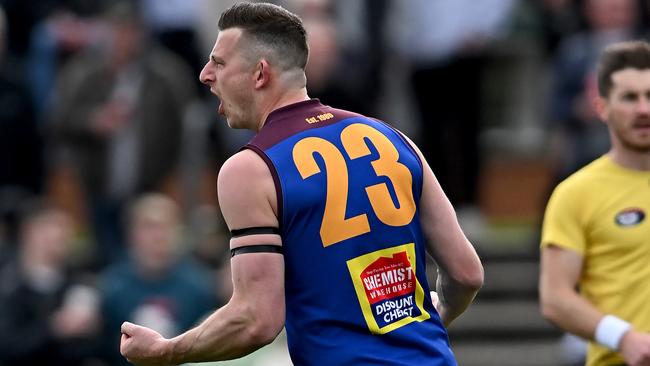 Jack Langford celebrates a goal for Banyule. Picture: Andy Brownbill