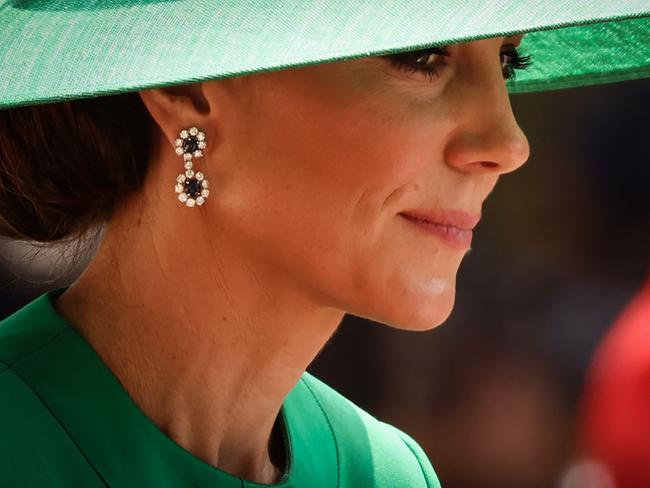 The Princess paired her outfit with a stunning pair of sapphire earrings from the late Princess Diana’s jewellry collection. Picture: AFP