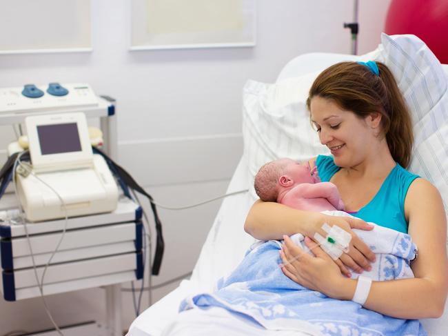 Generic photo of a mother and baby in hospital.  Mother giving birth to a baby. Newborn baby in delivery room. Mom holding her new born child after labor. Female pregnant patient in a modern hospital. Parent and infant first moments of bonding.    Picture: iStock