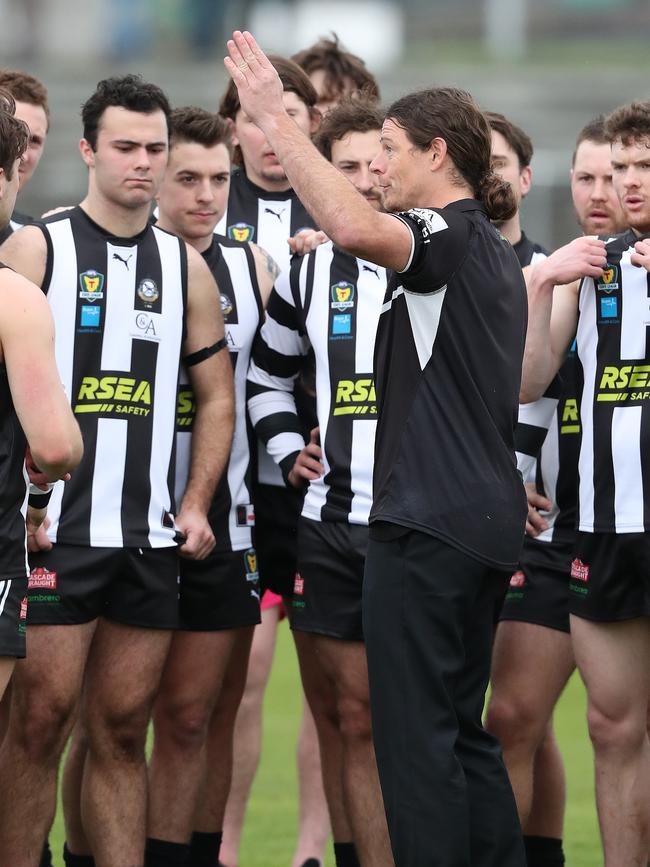 Glenorchy coach Paul Kennedy addresses his players at quarter time at Launceston. Picture: NIKKI DAVIS-JONES