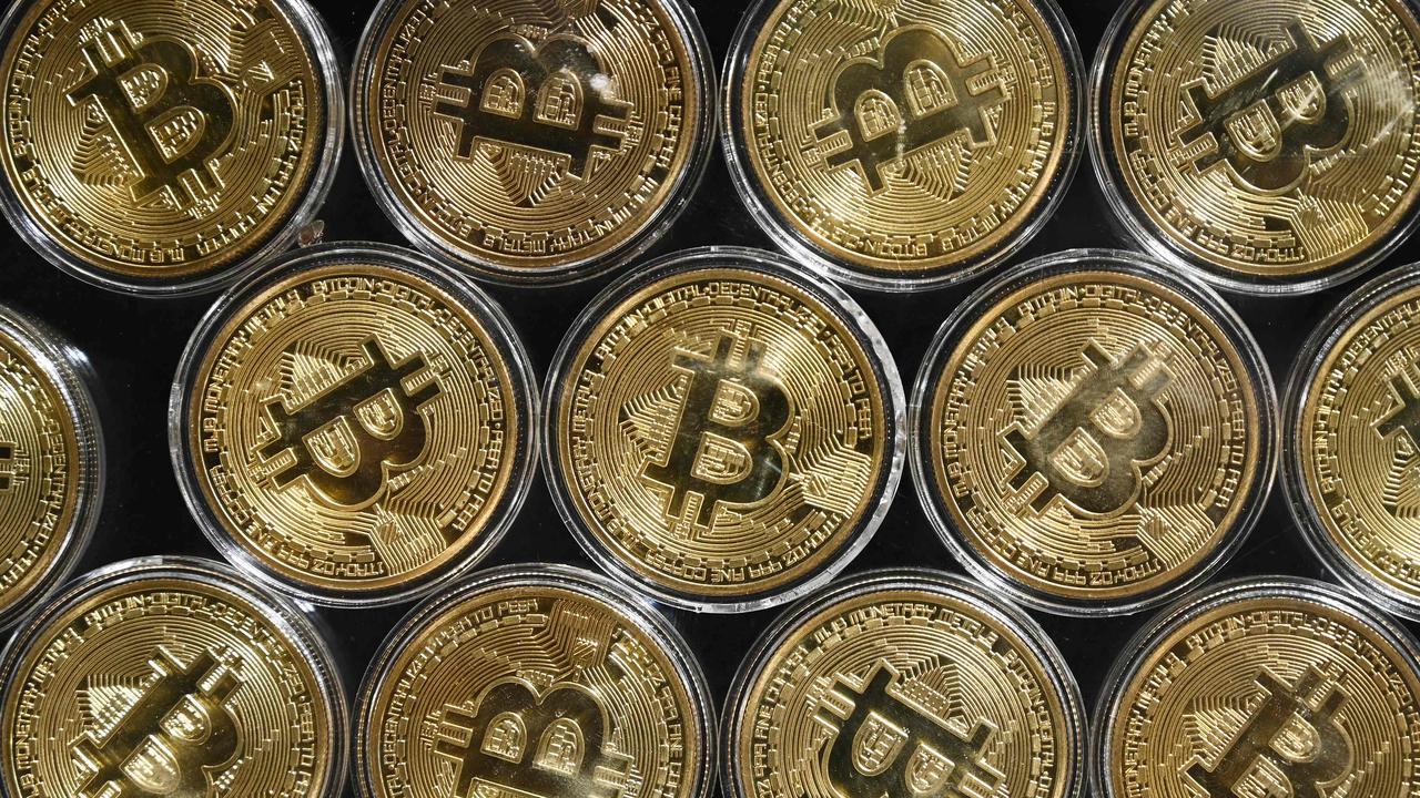 Bitcoin was created by a mystery person or group under the name of Satoshi Nakamoto in 2009 and exists without a central bank. Picture: Ozan Kose / AFP