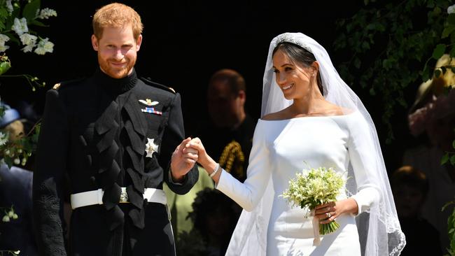 Prince Harry and Meghan Markle leave St George's Chapel after their wedding. Picture: Getty Images