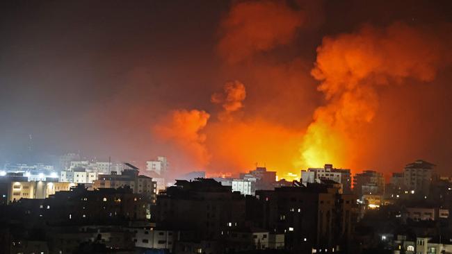 Fire erupts from the Andalus Tower as it is destroyed by an Israeli airstrike in Gaza City early on May 16. Picture: AFP