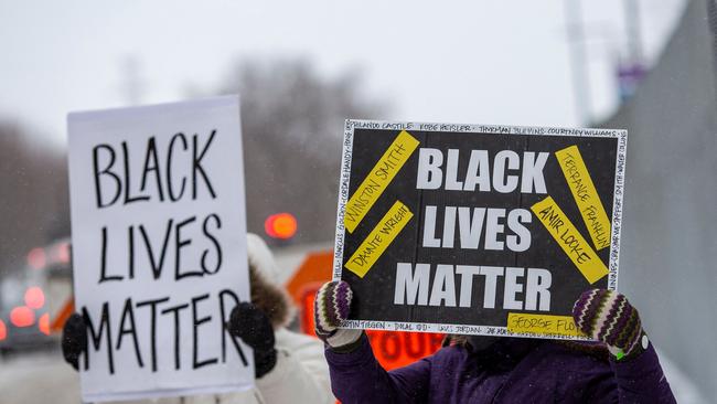 Demonstrators hold ‘Black Lives Matter’ signs in front of the US District Court in St Paul, Minnesota,. Picture: AFP